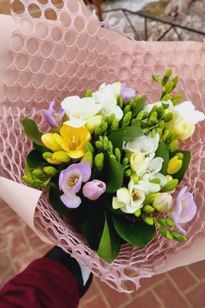 Fragrant freesia blooms Valentine's Day arrangement