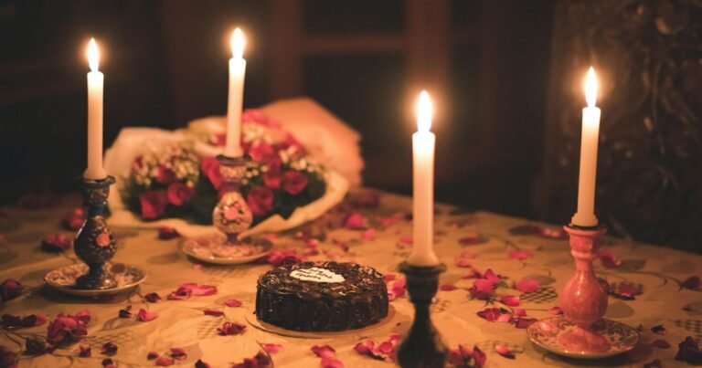 Romantic Valentine's Day gifts for her including jewelry, flowers, chocolates, and pink gift boxes arranged on white background